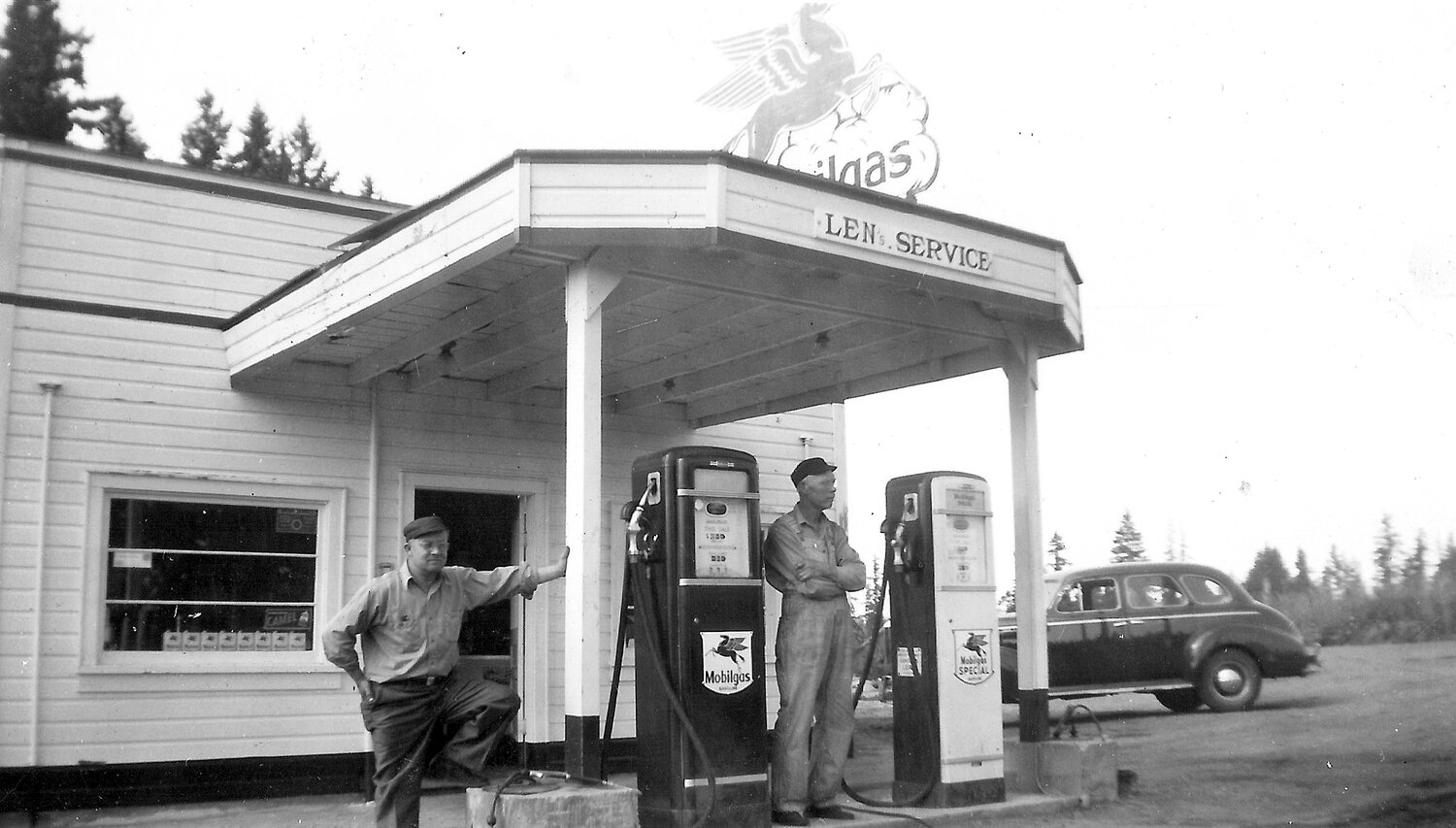 Mechanic Buster Denny (left) and an unidentified employee at Len’s Service in Wauna in the 1950s.